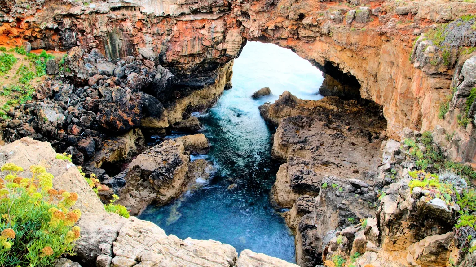 Boca do Inferno (Mouth of Hell), 2 km west of Cascais — Atlantic sea arch, waves exceed 10 m in winter