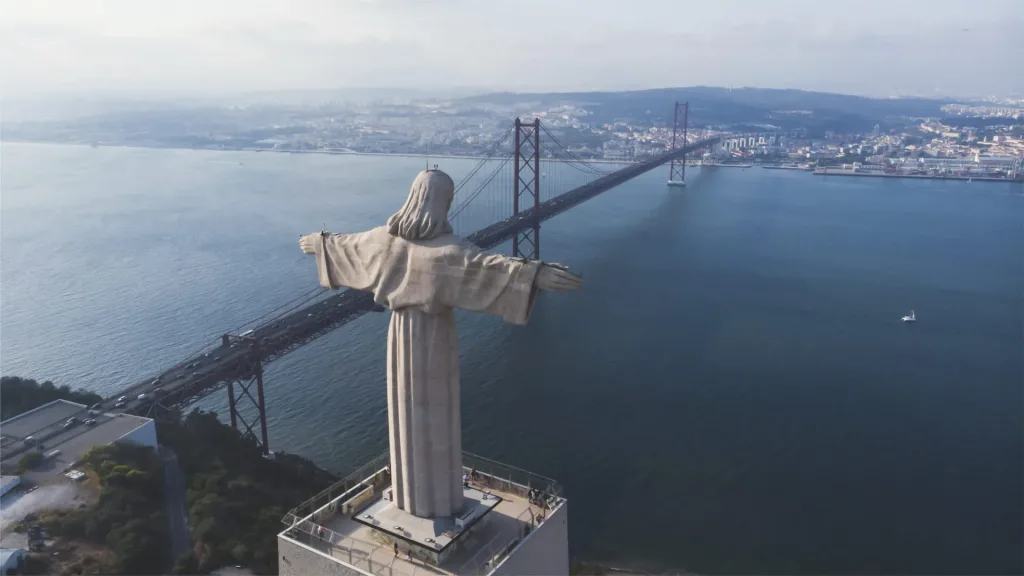 Cristo Rei, Almada — consecrated 17 May 1959; statue 28 m + pedestal 82 m = 110 m total; 360° panorama over Lisbon and the Tagus