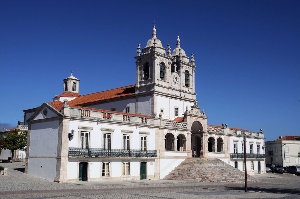 Sanctuary of Nossa Senhora da Nazaré baroque facade with twin bell towers, Sítio district, 110 metres above the Atlantic